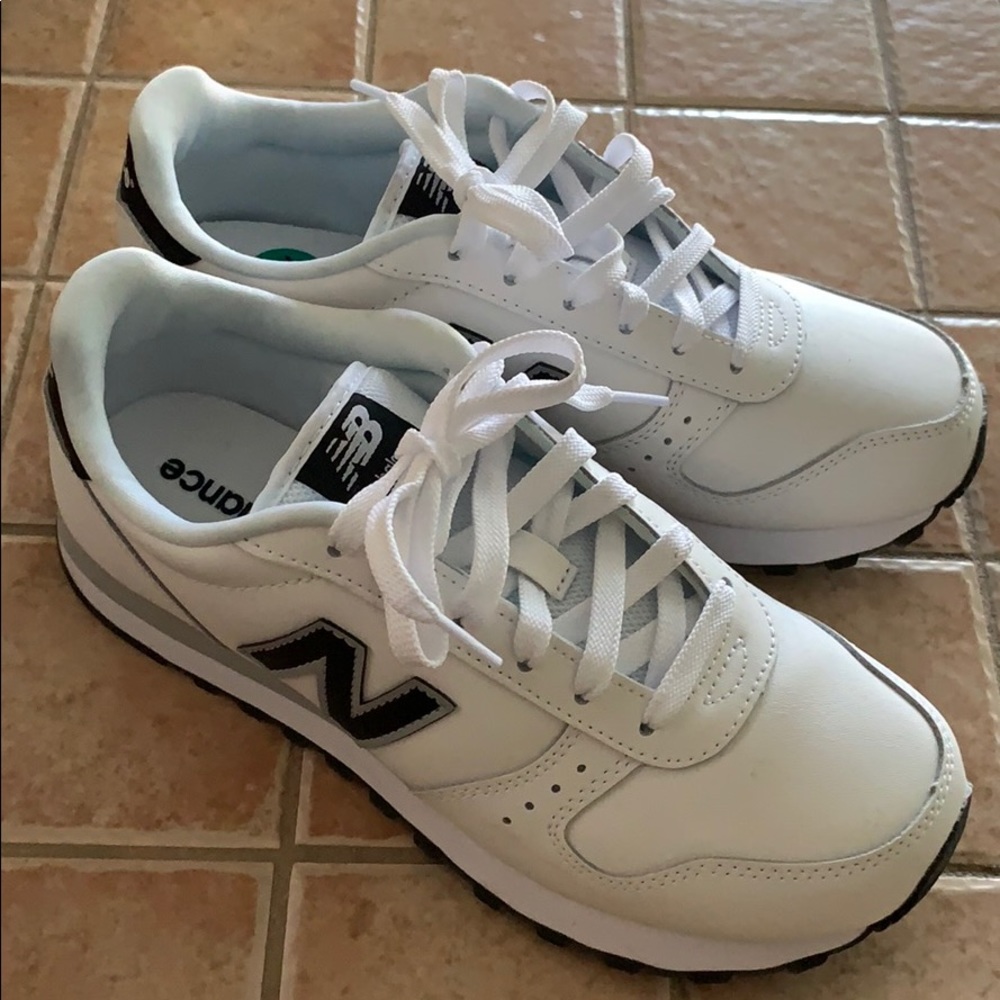 Women’s New Balance 311 Sneakers